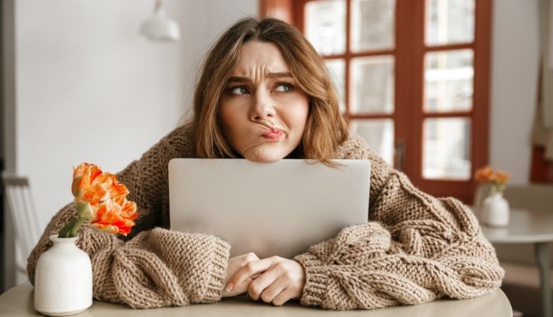 woman wondering is it better to buy or rent a home